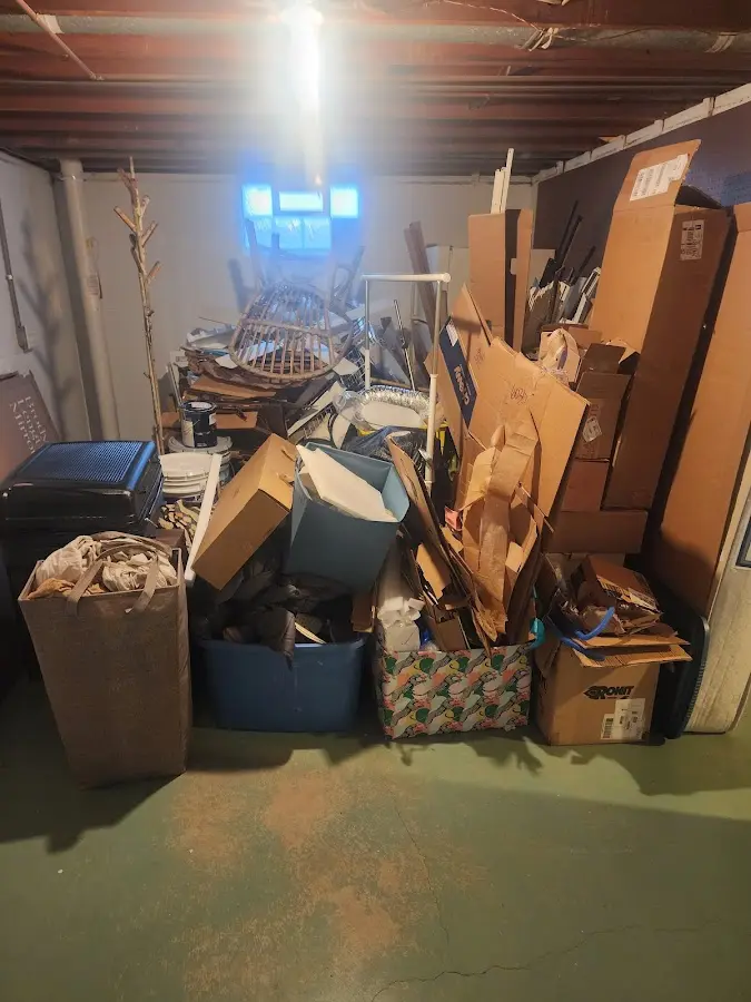 Roll-off dumpster container at job site for 15 Yard Dumpster Rental in Liberty Triangle